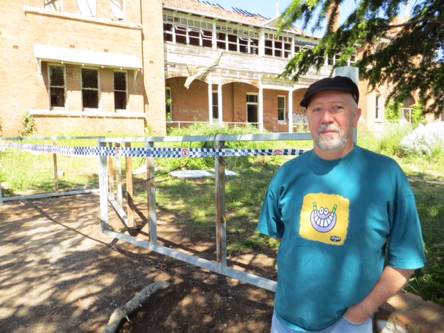 Ron McLoughlin outside the old orphanage. Photo:John Thistleton