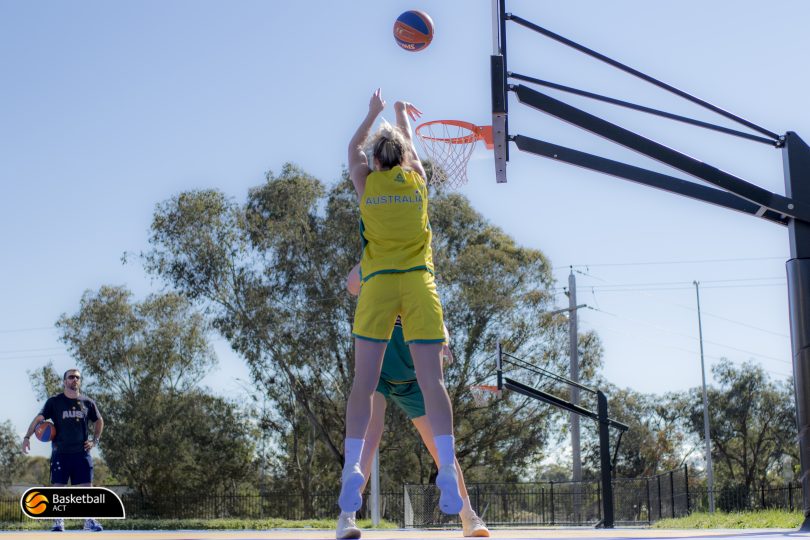 women playing basketball
