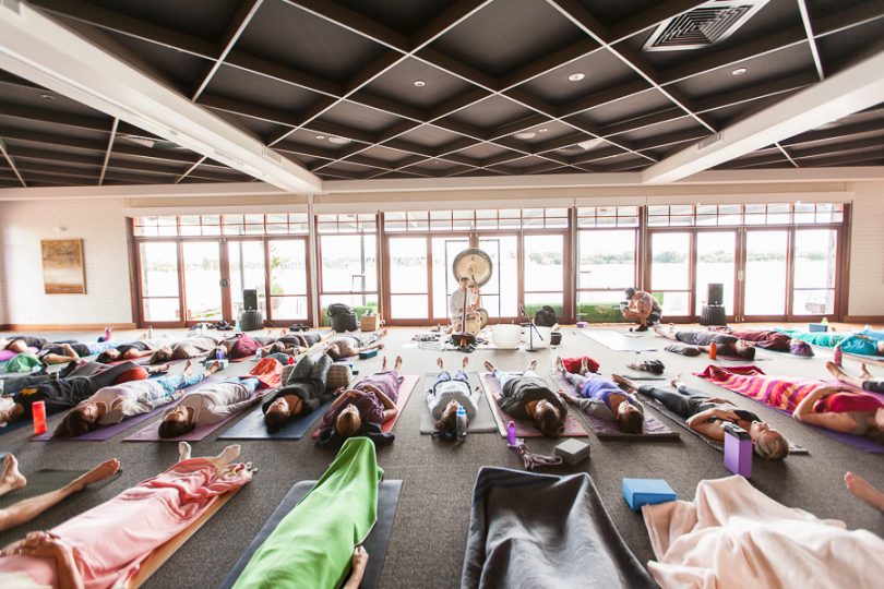 explore a range of Yogic styles and practices, from asana to guided meditation with live performers. Image by photographer Chi Chu