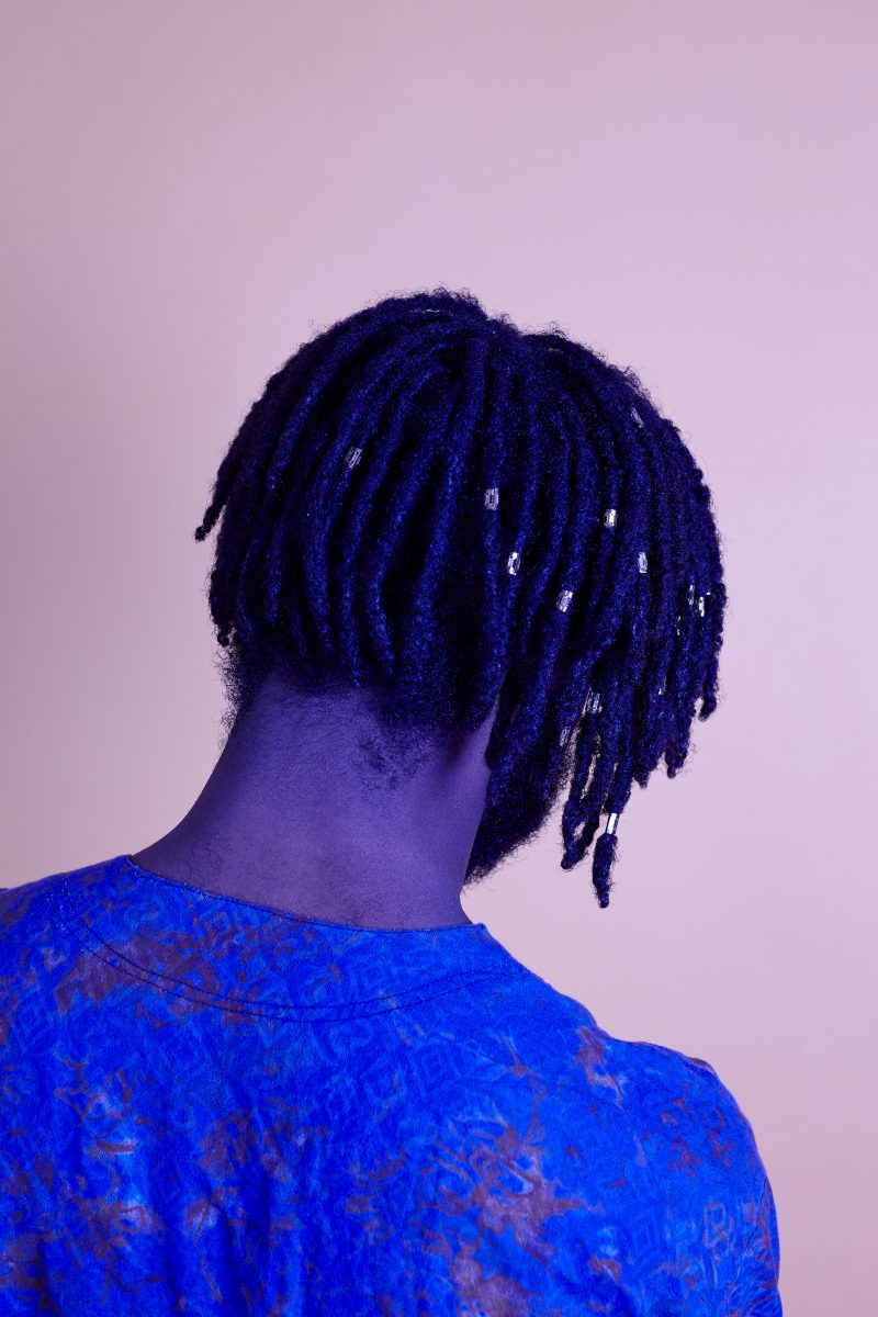 Photograph of Genesis Owusu facing away