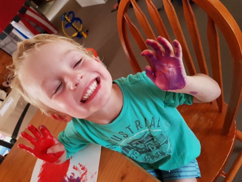 Euan Henshaw of Batemans Bay beat the grey skies with paint, look out mum! Photo: Rebecca Henshaw.