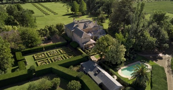 Edwardian grandeur with meticulously maintained 23-room manor house on park-like estate