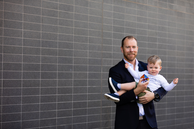 John is sure his son Freddie will be solving a Rubik Cube quicker than him in no time.