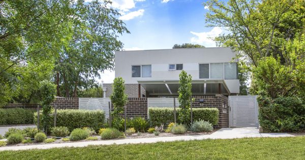 Spacious Turner townhouse offers four bedrooms and elegant open plan design