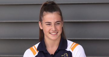 Former swimmer Brooke Gilroy jumping into the deep end
