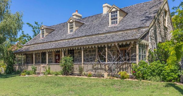 Landmark granite fieldstone home for sale in Braidwood built as an inn in 1856