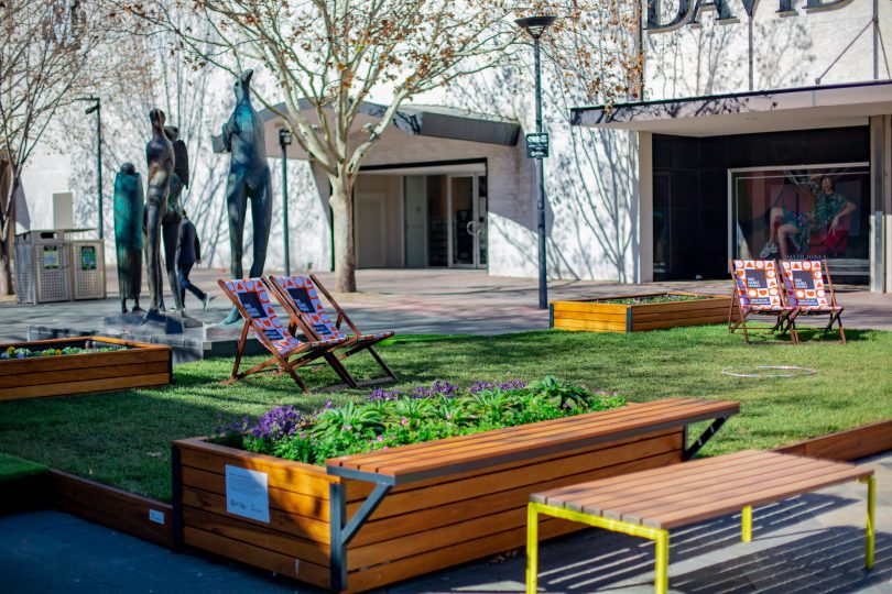 flower beds and green spaces to liven up the area.