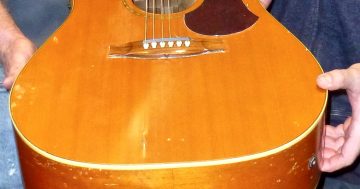 Smoke and water makes guitar gently weep once again