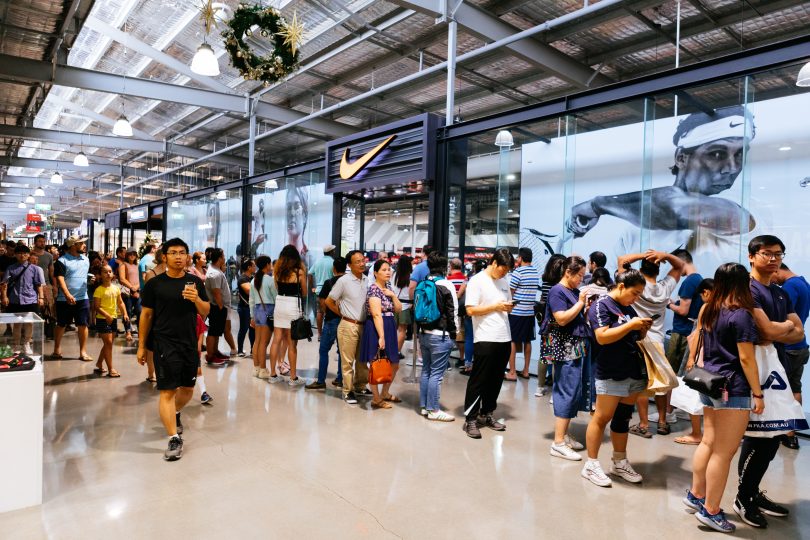Queue of people at retail outlet
