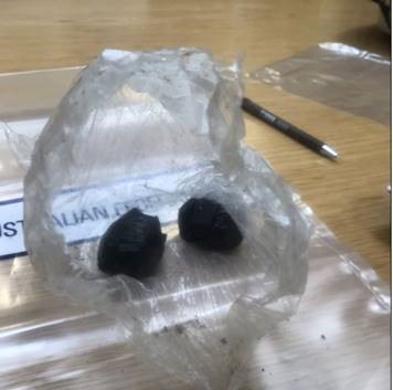 Police seized approximately 150 grams of heroin