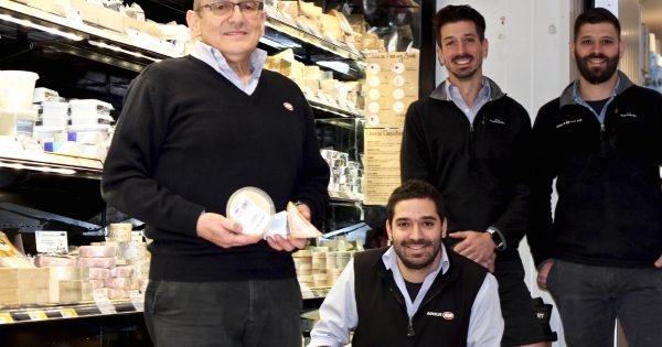 Manuel's back 'home' at Ainslie IGA and its famous wall of cheese