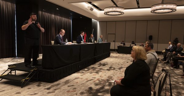 Barr tees off outside the ACTCOSS Leaders Forum, but inside it was watch this space