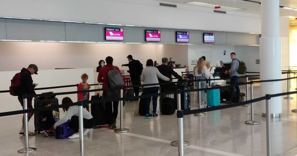 Canberrans flock to Queensland as border officially opens