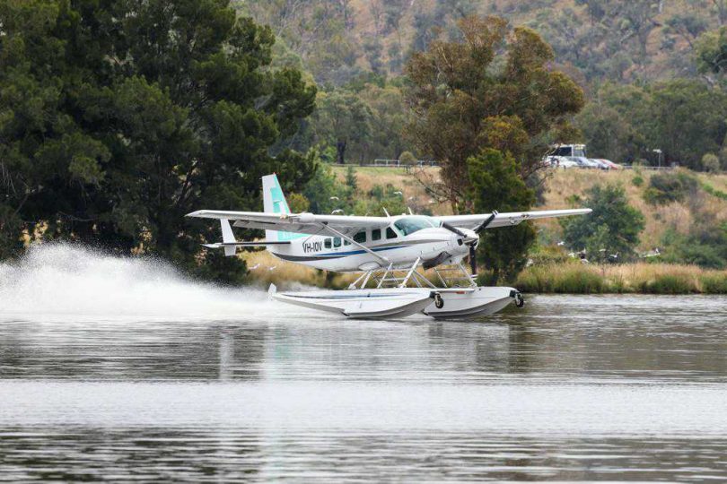 Seaplane touching down on Lake Burley Griffin