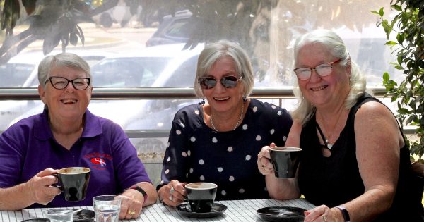 Red Hatters fit in with a splash of purple to connect women in Canberra