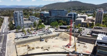 Why is there a crane on stalled city building site?