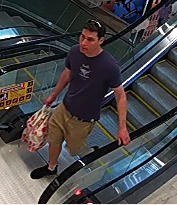 Man on escalator