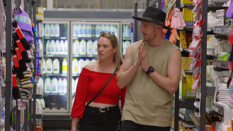 Bryce and Melissa in a supermarket.