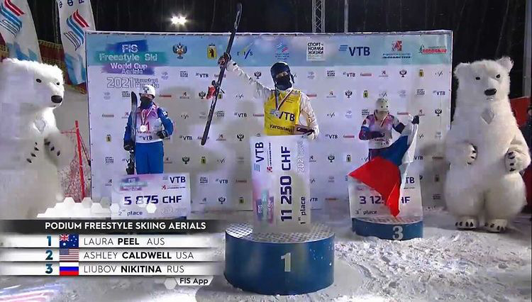 Laura at a winner's podium