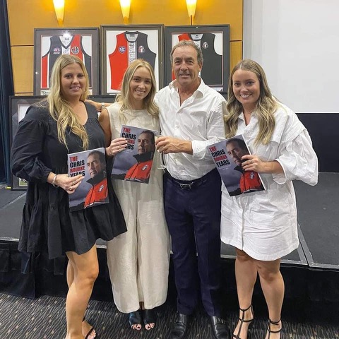 Chris Rourke with his daughters. Photo: Supplied.
