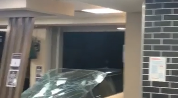 Car drives through KFC Hawker window