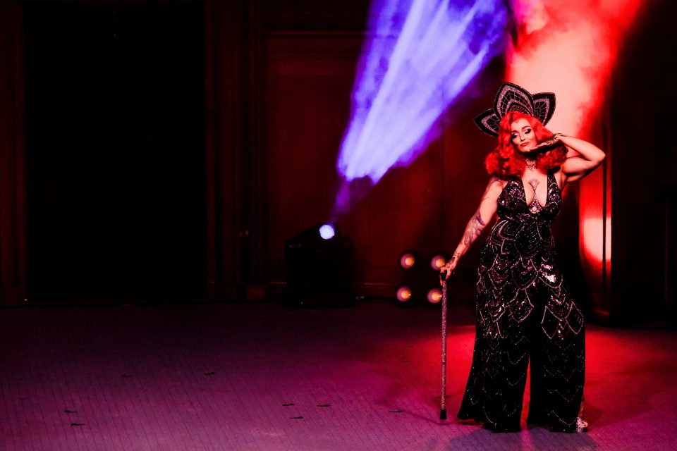 Burlesque teacher and performer Empress Eyrie in costume onstage