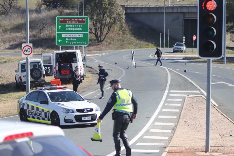 Police investigators at the Lady Denman Drive off-ramp