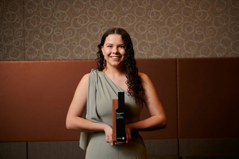 Dhani Gilbert holding Landcare award