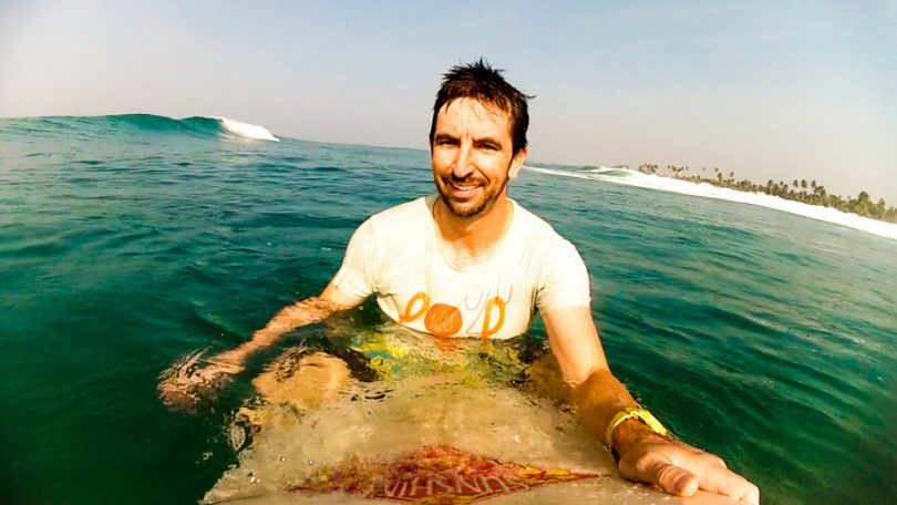 Dr Nicholas Taylor surfing