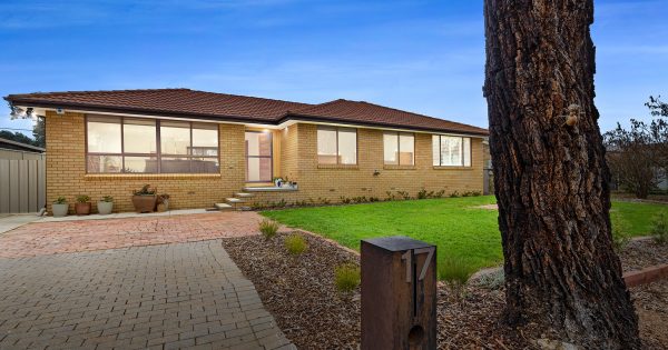 You won't believe what's behind the front door of this five bedroom home in Kaleen