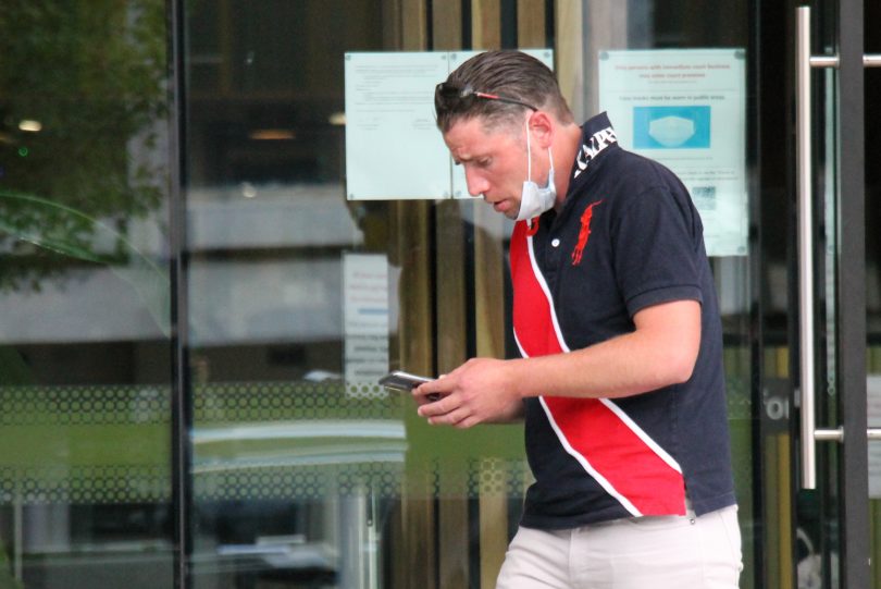Man leaving court