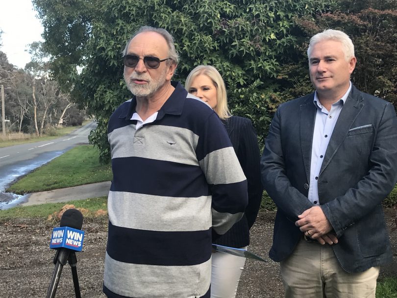 President of the Village of Hall and District Progress Association Robert Yallop discusses the issue flanked by Liberal MLAs Leanne Castley and James Milligan
