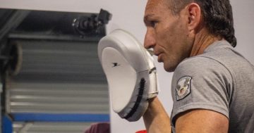 From hard early years, Yass coach wins the fight of his life