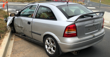 Man arrested in bushes after alleged car chase that ended by crashing into gutter