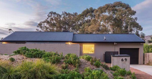 Renovated split-level entertainer offers privacy in popular Kambah