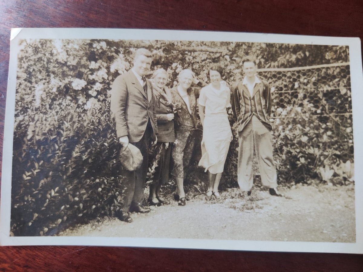 Black and white photo of five people