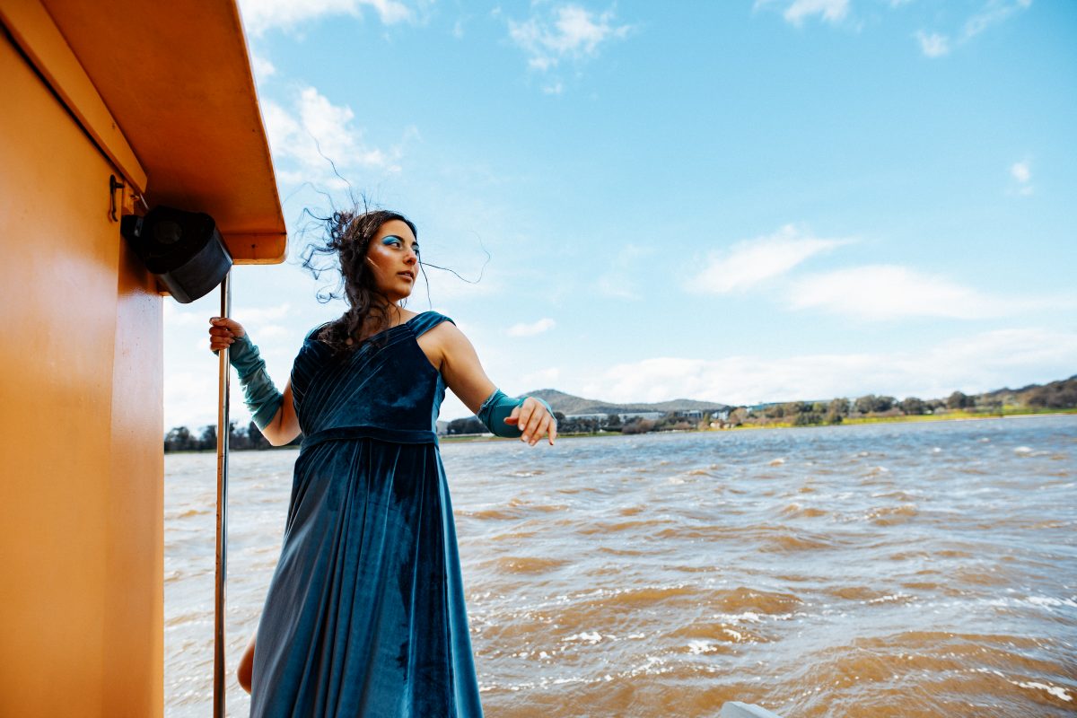 woman on a boat on a lake