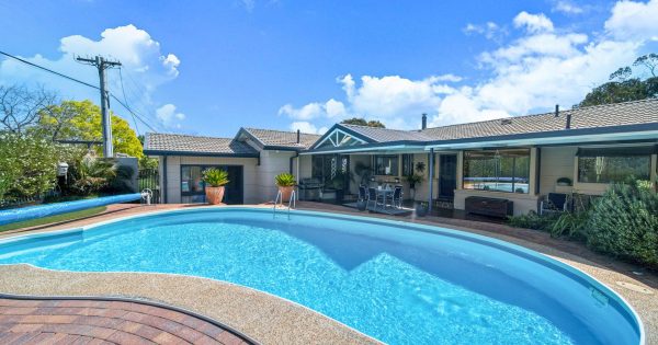 The picture-perfect castle fit for a family on the hills of Giralang