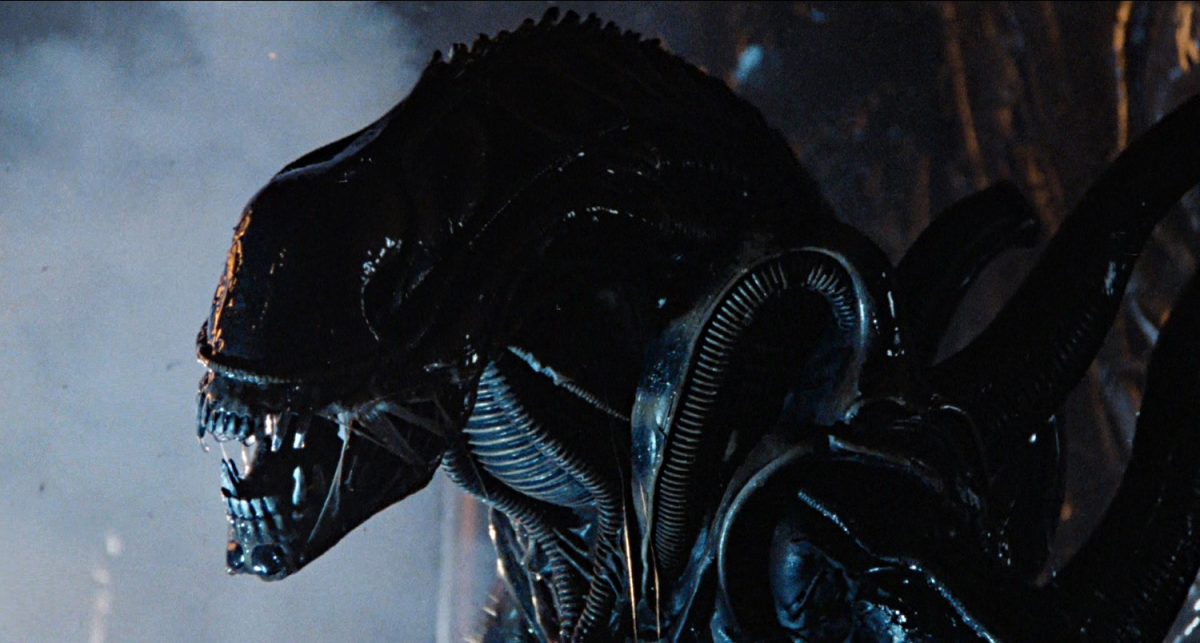 Still from Alien showing an alien roaring