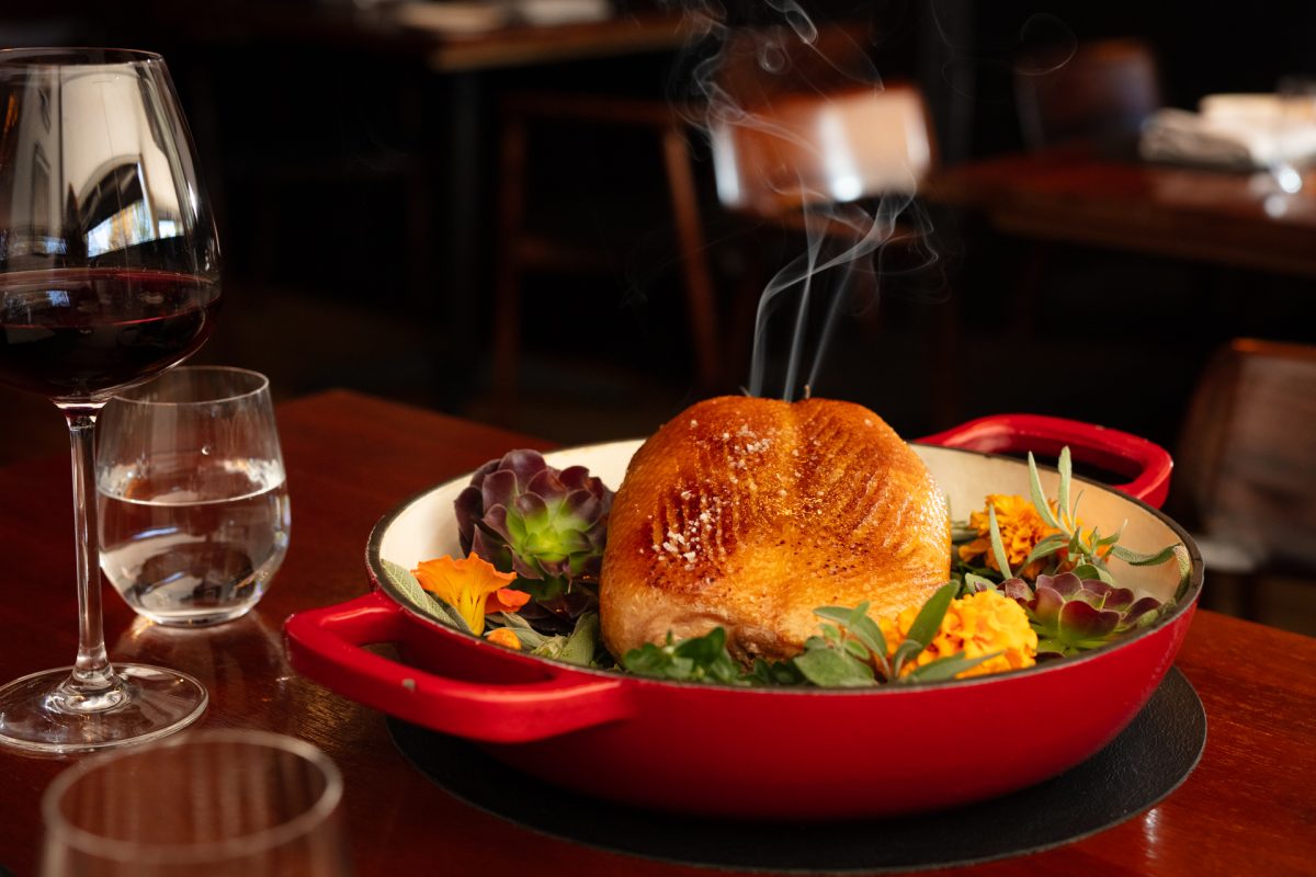 photo of a table set with food an glasses