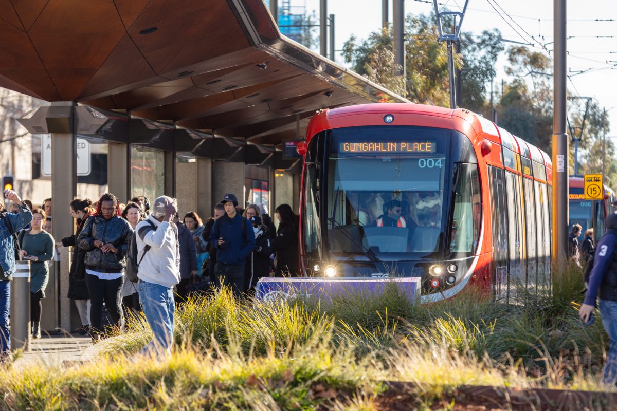 Passengers exiting light rail vehicle