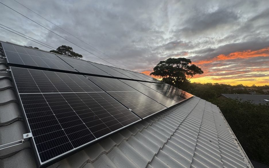 Solar on roof during a sunset.