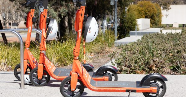 Helmet wearing 'just not the norm' for majority of Canberra's young e-scooter riders, study finds