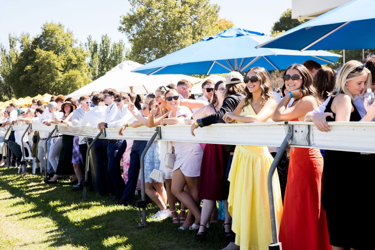 people standing trackside at Thoroughbred Park