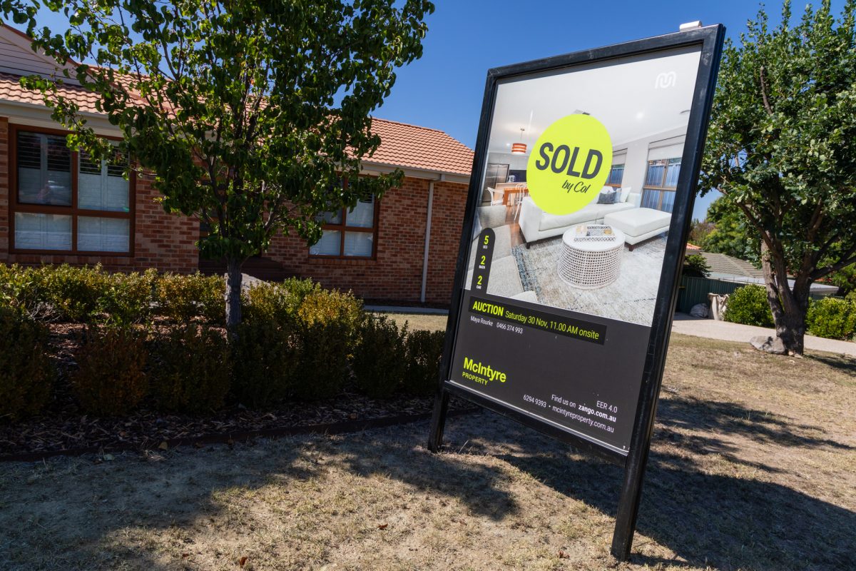 Sold sign in front yard