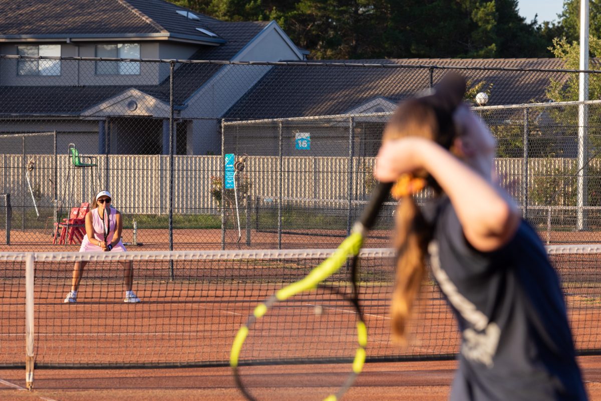 Women play tennis