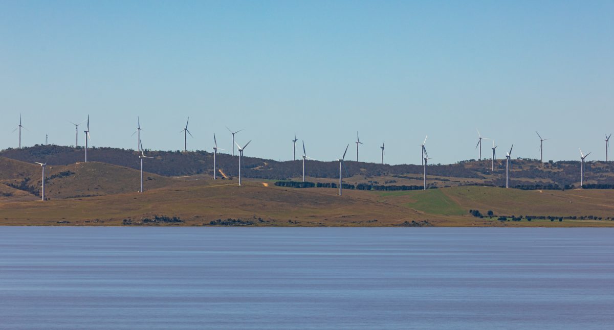 Wind turbines by a lake