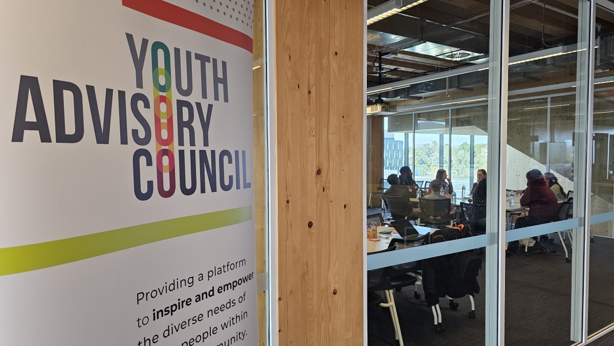 Youth Advisory Council group meeting in ANU conference room 2025