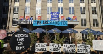 Demonstrators scale government offices to protest gas project expansion
