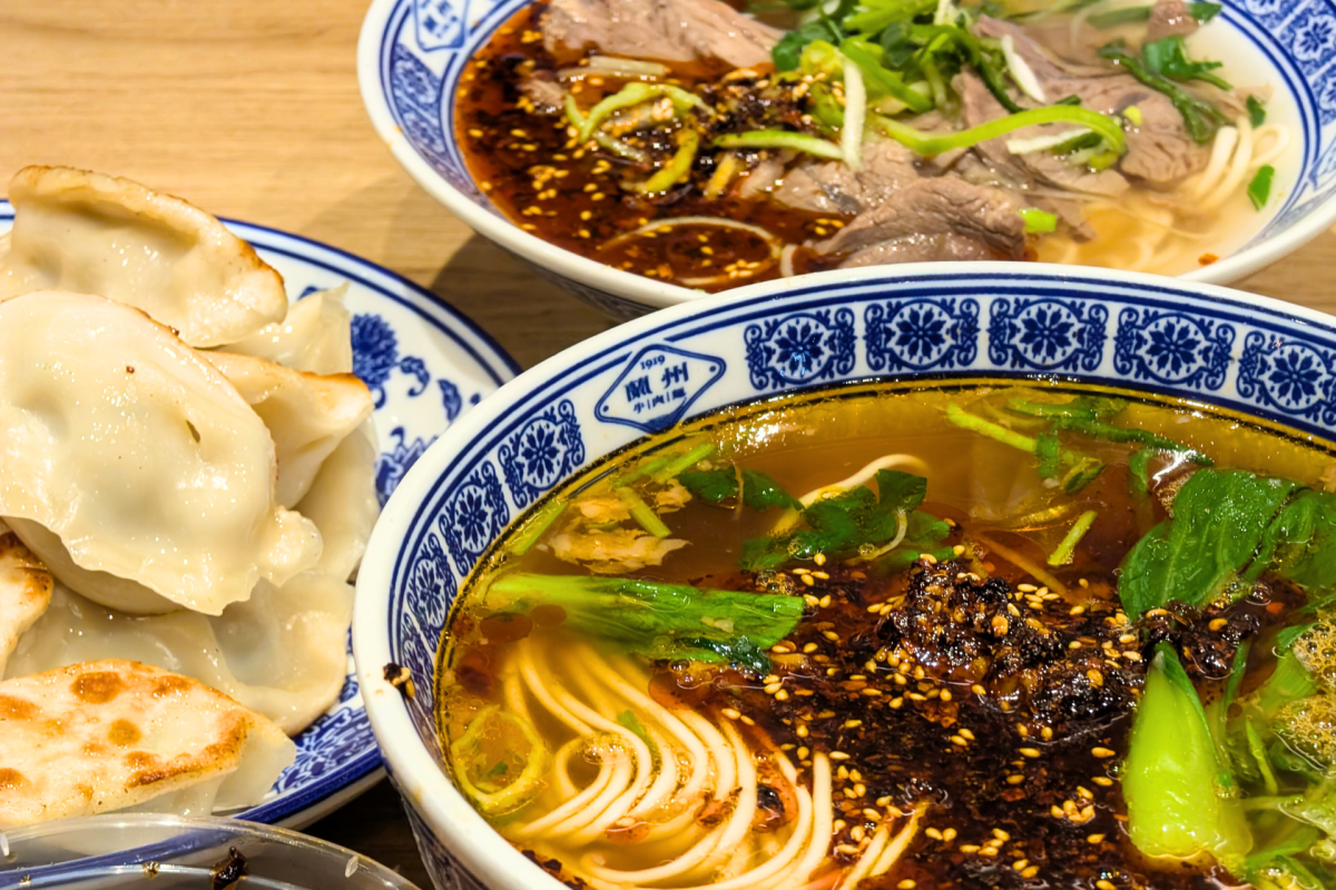 2 bowls of soups and a plate of dumplings.